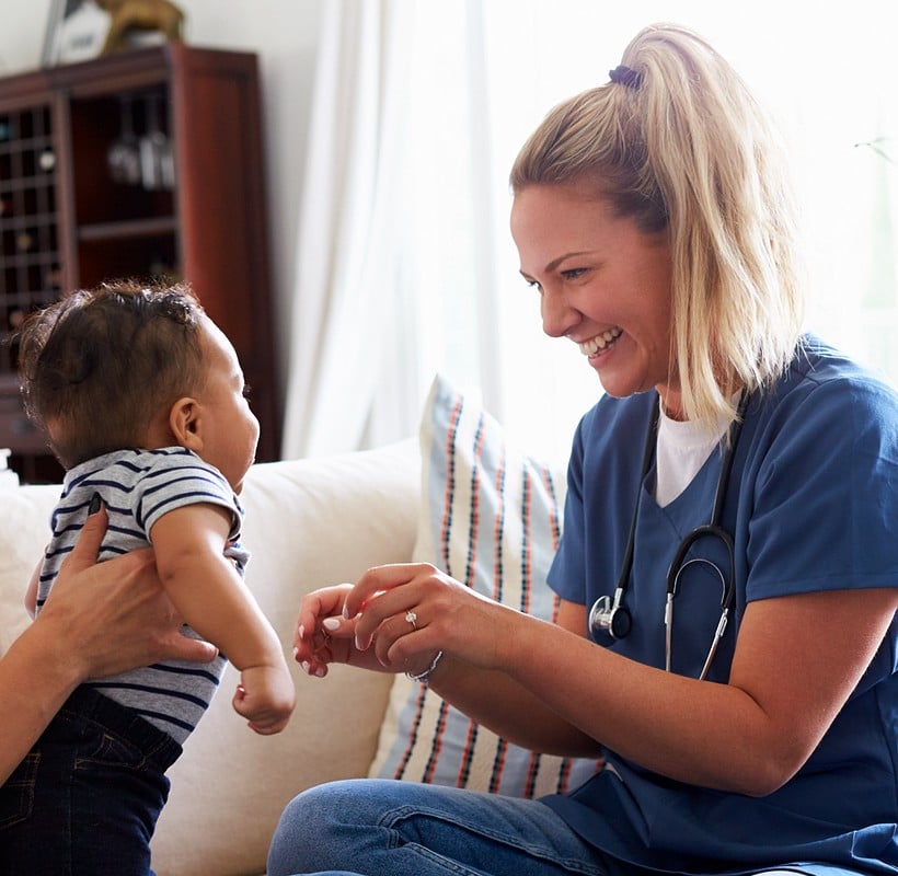 nurse with infant