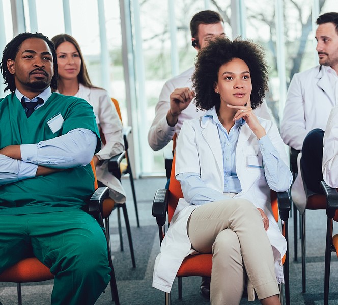 nurse students listening in classroom