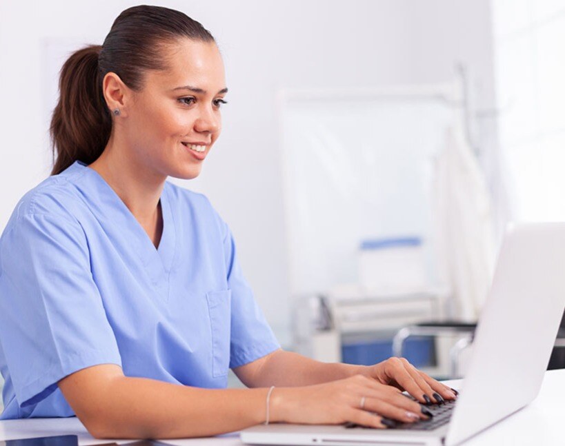 Nurse eLearning at laptop
